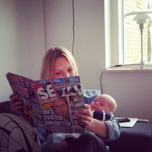 A woman reading a fashion magazine